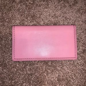 Pink leather coach checkbook cover